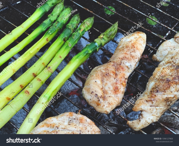 stock-photo-green-asparagus-grilling-with-chicken-breast-top-view-1396127903